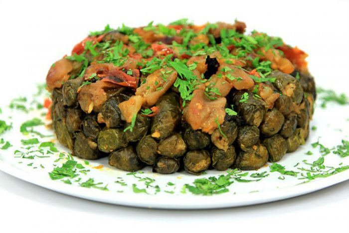 طريقة عمل طاجن ورق عنب بالكوارع طريقة عمل طاجن ورق عنب بالكوارع